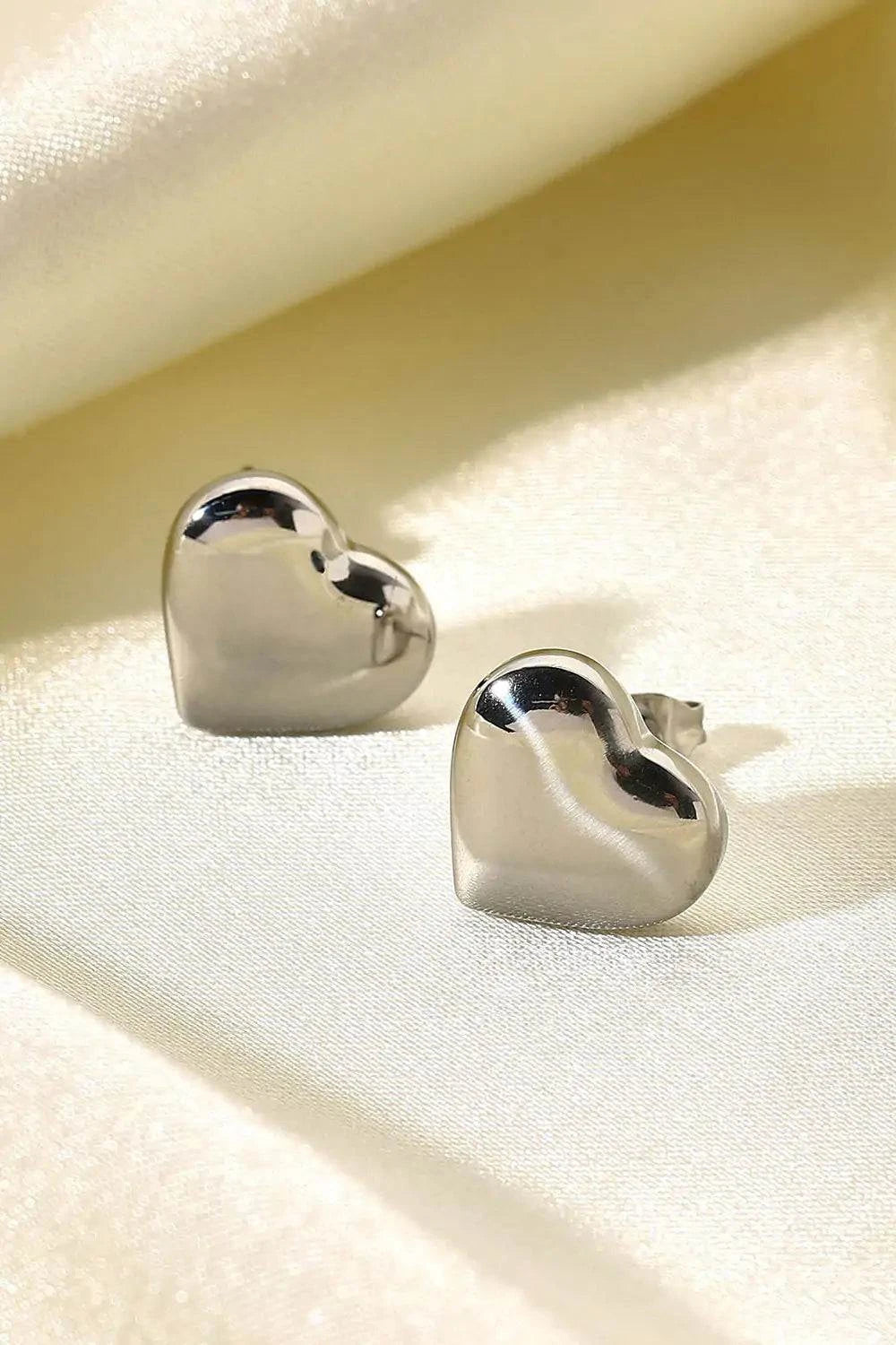 Radiant Heart Elegance:Enchanting Stud Earrings.