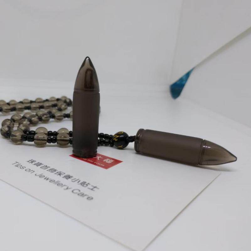 Obsidian-Bullet Pendant Necklace.