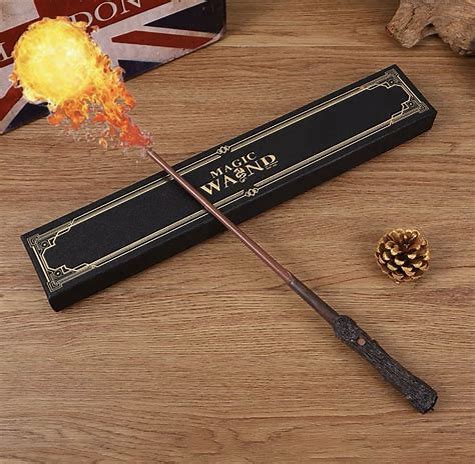 Magic wand with a dark textured handle and slender brown shaft, shown with a glowing fire effect; Choose a Fire-Shooting Wand