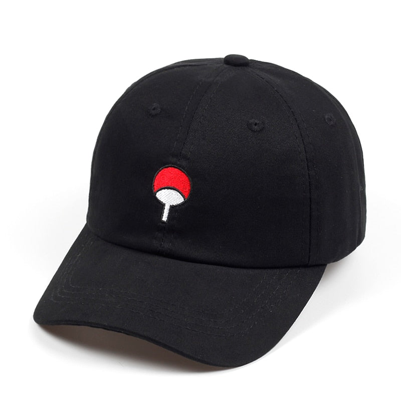 Uchiha Family Crest Hat in black cotton, featuring a curved brim and embroidered red-and-white fan crest.