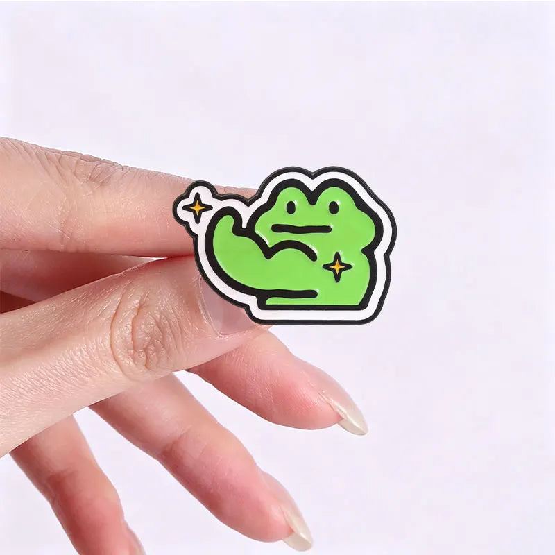 Funny Frog Meme Enamel Pin – Cute Cartoon Muscle Frog Brooch for Backpacks, Jackets & Lapels