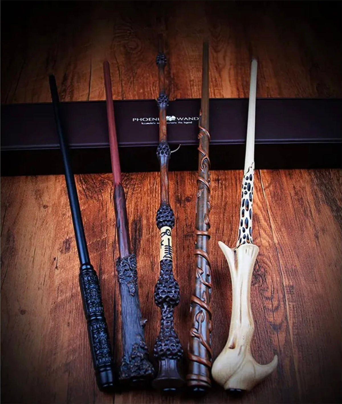 Harry Potter Magic Fireball wand collection with five ornate wands in black, burgundy, brown and ivory finishes.